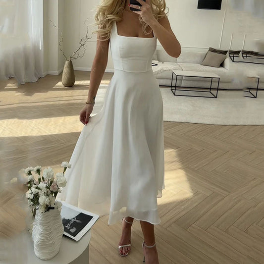 Couture-moda | Women's Elegant Sleeveless Solid Color Dresses - Image 1