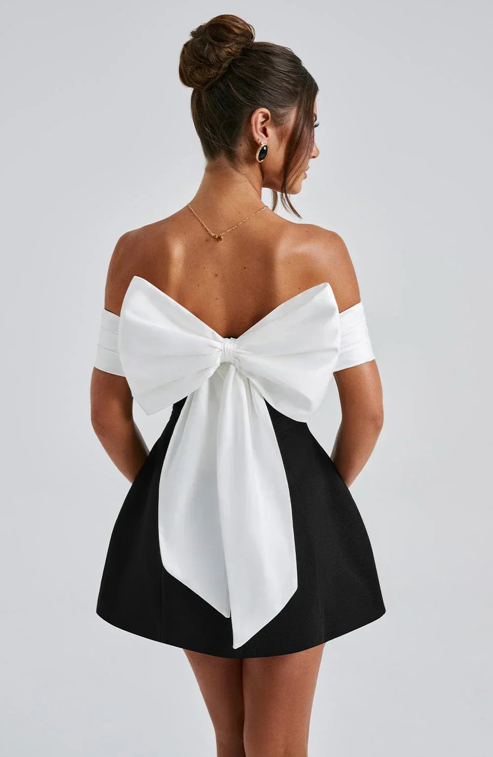 Jessica | Elegant Noir Mini Dress with Modern Bow Detail - Image 1
